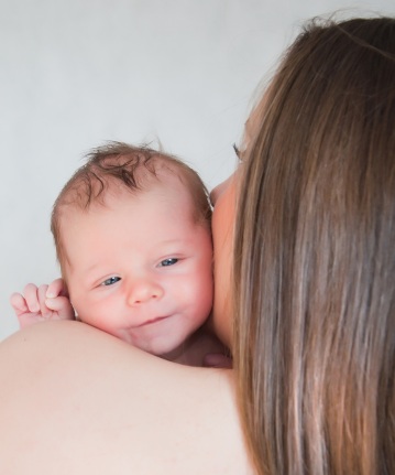 Baby on mother's shoulder